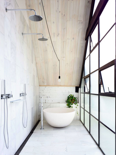 Shower and tub in Melbourne loft built in an old industrial space. [1600x2129]