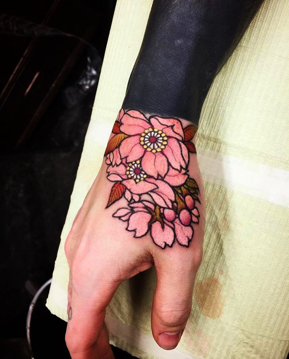 cherry blossom hand tattoos