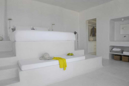 Summer cave holiday house in Santorini by Kapsimalis Architects...