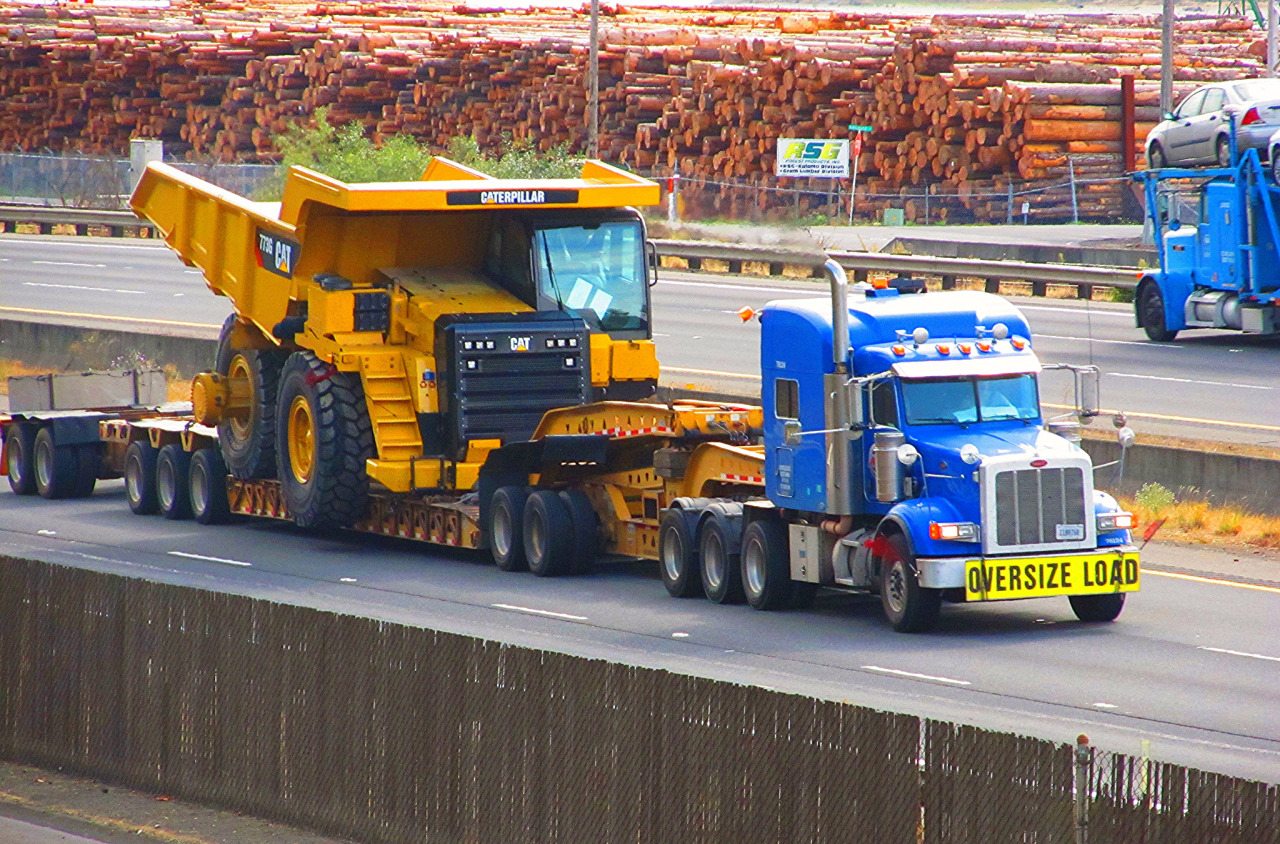 Semitrckn — Peterbilt custom 386 heavy haul loaded with a haul...