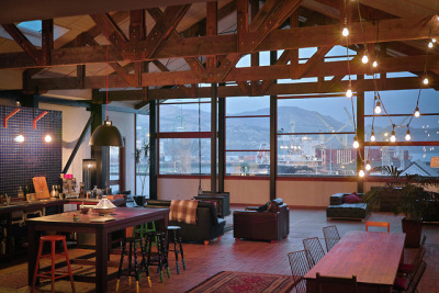 Former warehouse refurbished into an industrial loft with skylights and exposed beams overlooking the harbour in Lyttelton, New Zealand [2000×1333]