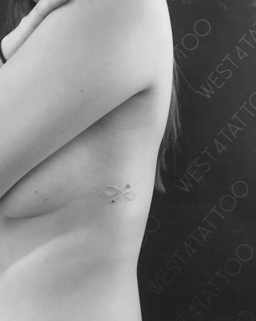 By Wicky Nicky, done at West 4 Tattoo, Manhattan.... side boob;small;mathematical;symbols;wickynicky;languages;arrow;rib;tiny;native american;ifttt;little;infinity;morse code;minimalist;infinity arrow