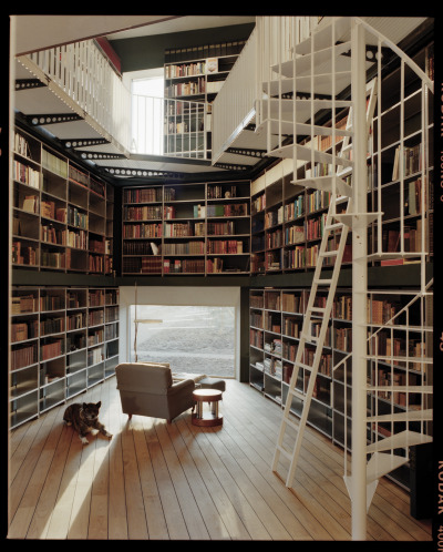 A cozy home library containing ~5000 books [1523x1898]