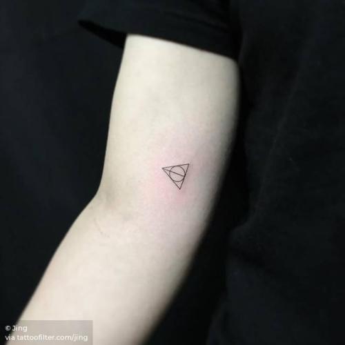 By Jing, done at Jing’s Tattoo, Queens.... deathly hallows;jing;small;micro;symbols;harry potter;line art;inner arm;tiny;ifttt;little;minimalist;film and book;fine line
