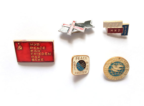 Vintage peace-themed pins (buy here)