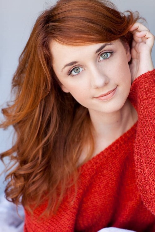 gloriouslyred:Laura Spencer looking good in that red sweater.