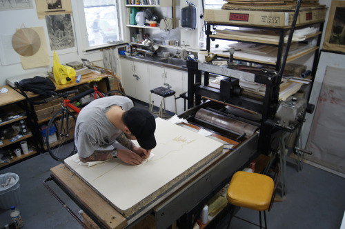 aucklandprintstudio:Pepe stenciling out the gum resist for the...