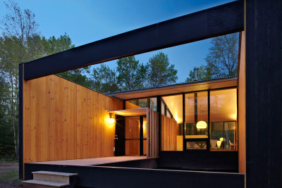 evrtstudio:<br /><br />Wisconsin Cabin by Charlie Lazor<br />A modern prefab cabin built on a remote island in northern Wisconsin. Charlie Lazor is the originator of the FlatPak house.<br />