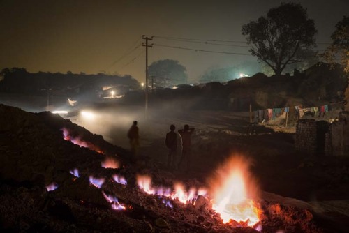 “THE EARTH IS ON FIRE”In Jharia, India, the...