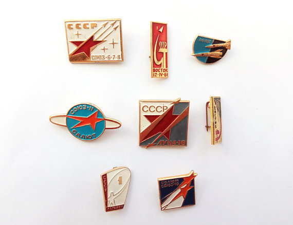 Vintage Soviet space-themed pins http://etsy.me/2GeH25Q