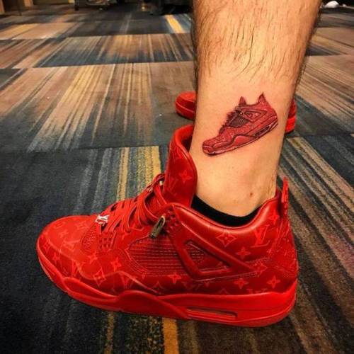 Phoenix AZ USA Detailed view of the Nike shoes and Air Jordan tattoo on  the leg of Phoenix Suns center Marcin Gortat against the Oklahoma City  Thunder at the US Airways Center 