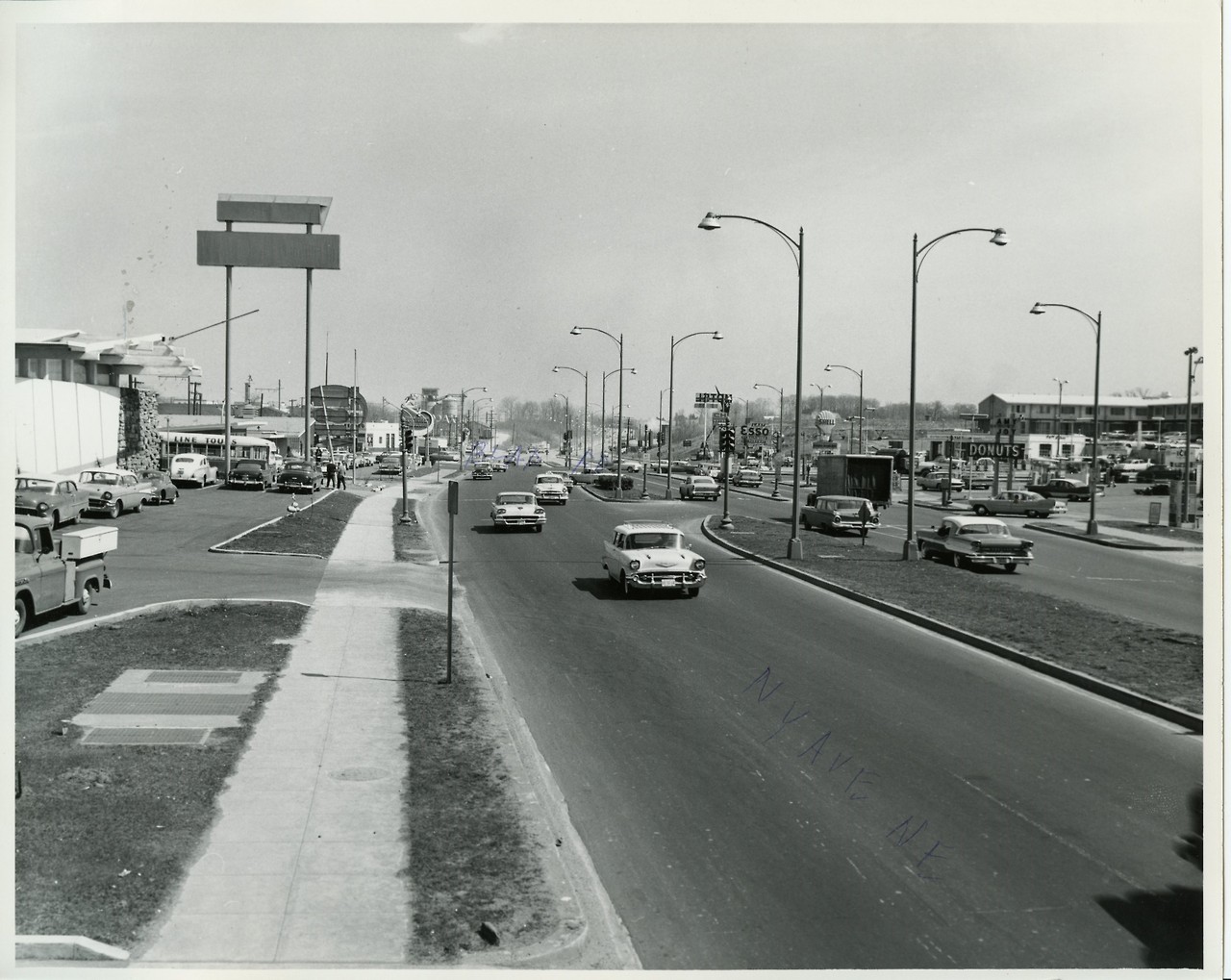 Library & Archives — A busy day in the 1960s at the intersection of New...