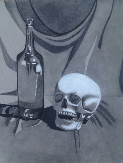 Charcoal still-life with bottle and skull