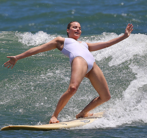 celebpaparazzi:Margot Robbie surfing in Hawaii - July 19th,...