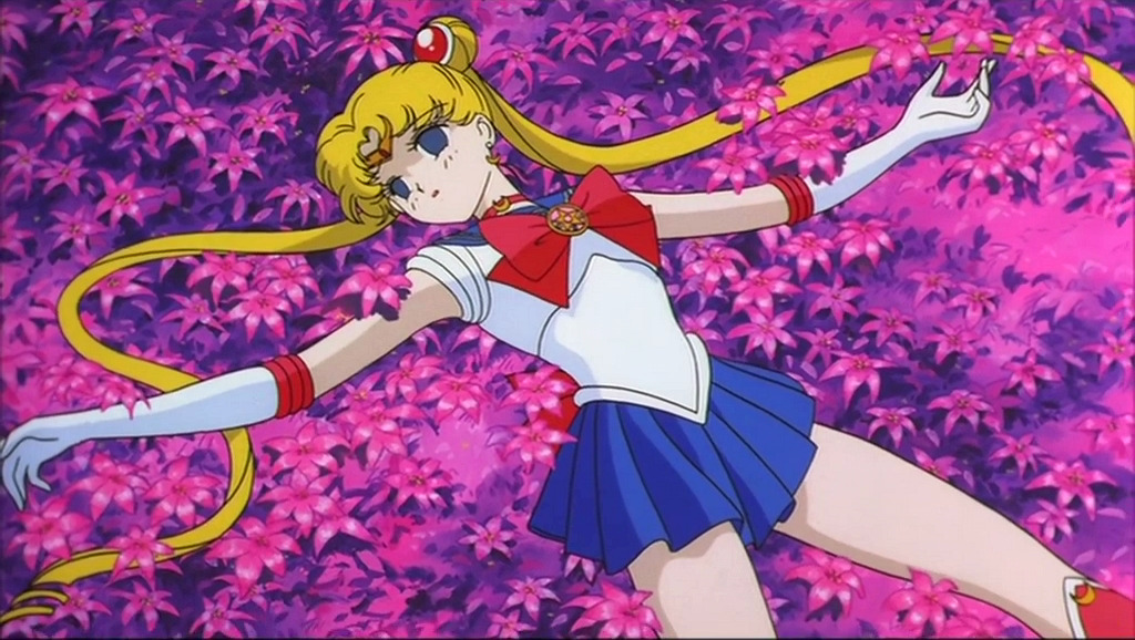 Sailor Snapshots — Tuxedo Mask and Sailor Moon laying battered in the...
