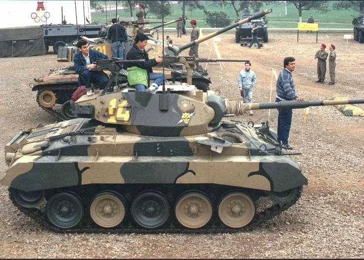 Chilean M24 Chaffee, with civilians for scale.... - Weapons Lover