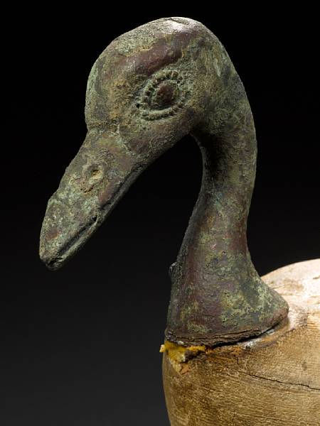 An Egyptian wood and bronze goose.Late Period, circa 664-32 B.C. © 2002-2010Bonhams 1793 Ltd.,