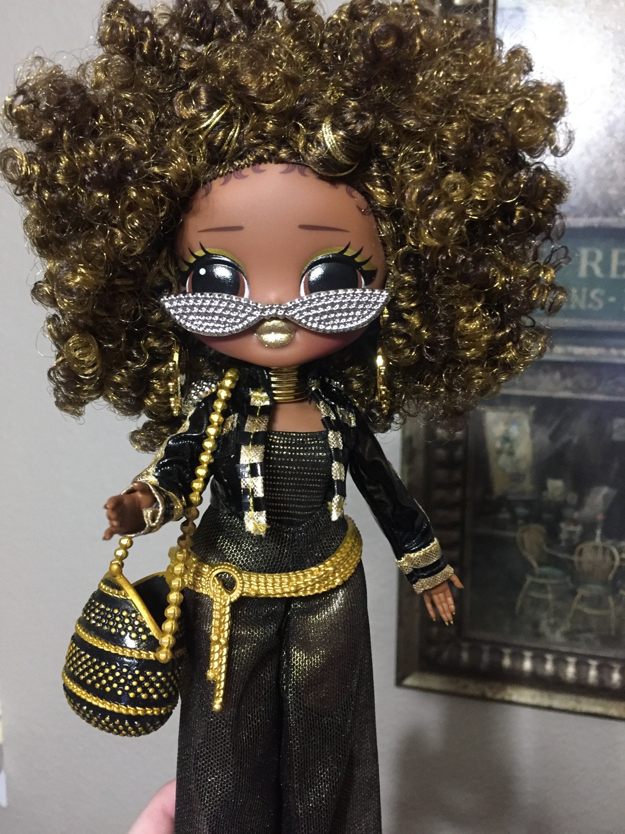 black lol doll with gold hair