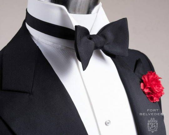 A Fort Belvedere barathea bow tie with a wing collar shirt.