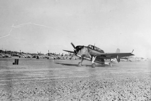 A Marine Corps TBM-3 Avenger taxis by USAAF P-51... - Fighter/Cargo ...