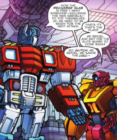 Panel where Optimus urges the team to 'top up' before the battle