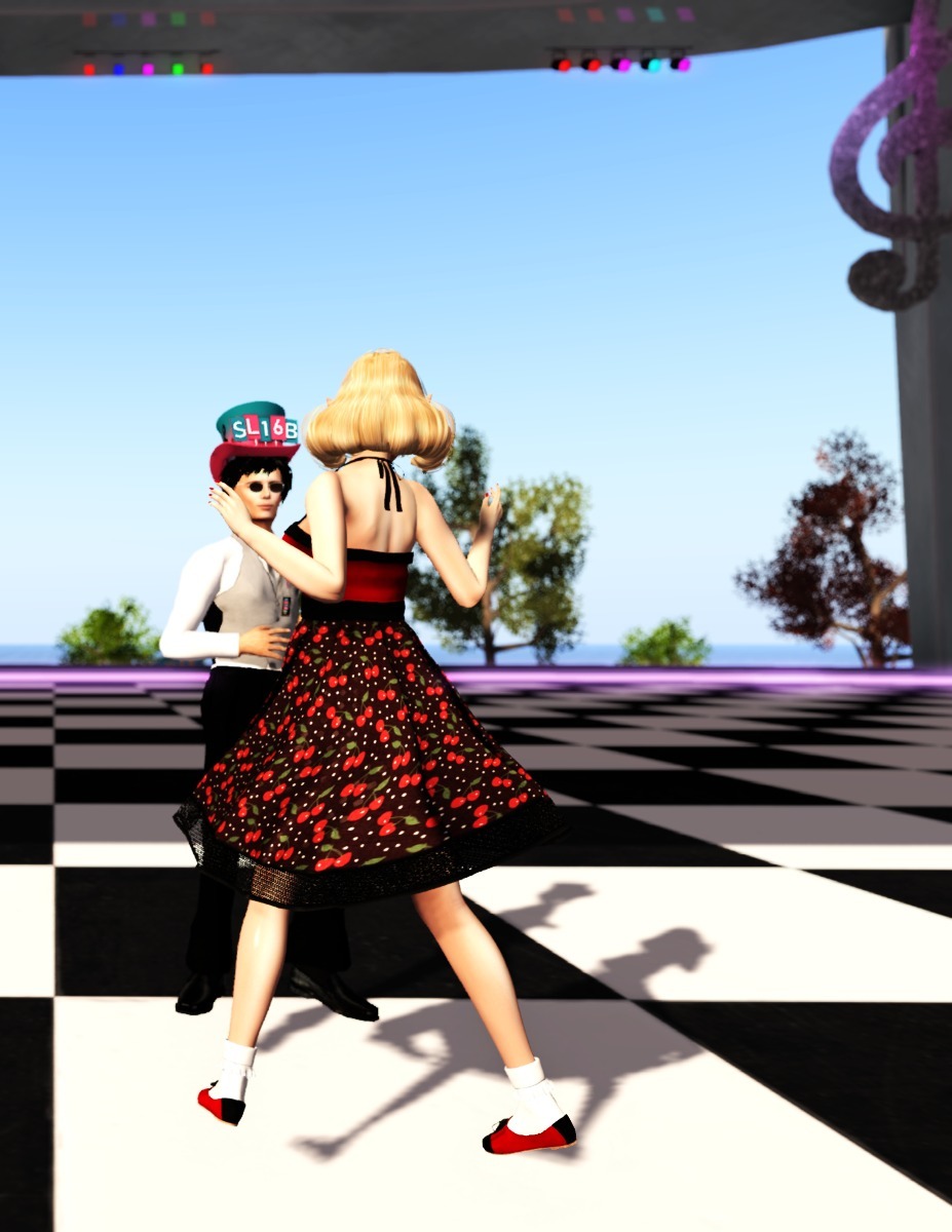 Couple dancing at SL16B's DJ stage
