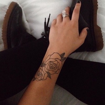 rose tattoo on wrist