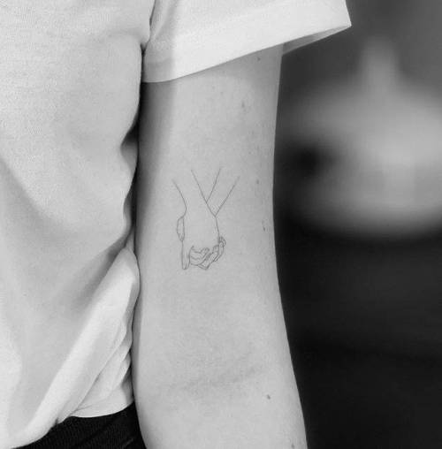 By Jakub Nowicz, done at PURO Tattoo Studio, Milan.... hand;small;jakubnowicz;anatomy;single needle;bicep;tiny;love;ifttt;little;holding hands