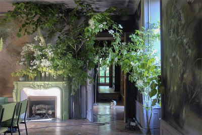 French artist Claire Basler lives and paints in her home Château de Beauvoir where she creates huge paintings of flowers. The place looks blooming - an eternal summer