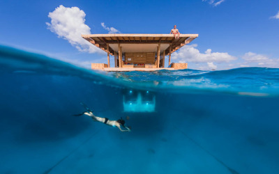 travelingcolors:<br /><br />Manta Resorts Underwater Hotel Room opens in Pemba Island | Tanzania  (by Genberg Underwater Hotels  - photos byJesper Anhede)<br /><br />Situated off the eastern coast of Africa by Pemba Island, a private floating island at the Manta Resort provides guests with an all-inclusive hotel room submerged four meters below the surface of the ocean. Designed by Swedish company Genberg Underwater Hotels, each of the three levels that make up the buoyant building has its own unique view: a rooftop terrace for sun bathing in the day and star gazing at night, a landing deck at sea level equipped with a lounge and restroom, and an underwater hotel room below surrounded by panes of glass for a 360 degree marine panorama. <br /><br />