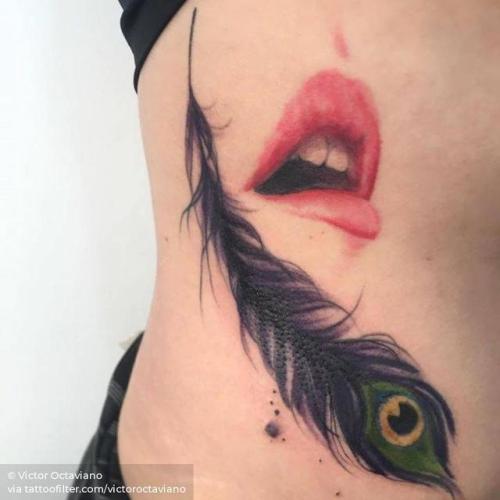 By Victor Octaviano, done at Puros Cabrones Tattoo, Santo André.... anatomy;big;waist;mouth;watercolor;rib;native american;peacock feather;feather;facebook;twitter;victoroctaviano