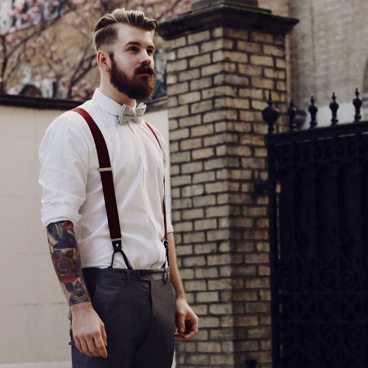 maroon shirt and grey pants