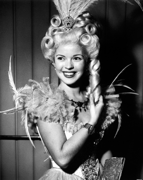 manyfetes:Shirley Temple dressed as Marie Antoinette at a...