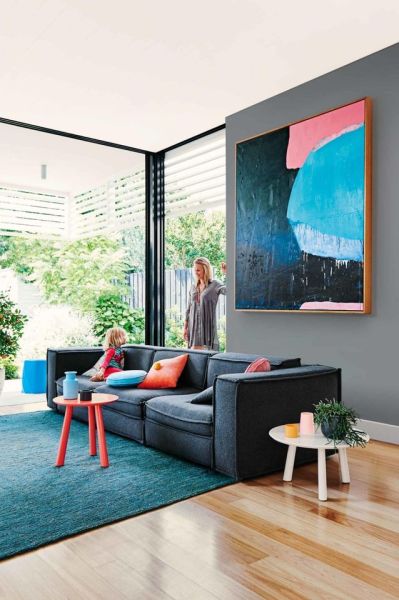 Get the look: living room with colourful accents. From the April 2016 issue of Inside Out magazine. Styling by Heather Nette King. Photography by Lisa Cohen. Artwork by Andrew O'Brien (andrewobrienartis). Available from newsagents, Zinio,www.zinio.com, Google Play, play.google.com/, Apple’s Newsstand, itunes.apple.com/, and Nook.