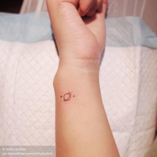 Nice and simple Planets on wrist tattoo | Trendy tattoos, Minimalist tattoo,  Tattoos for guys
