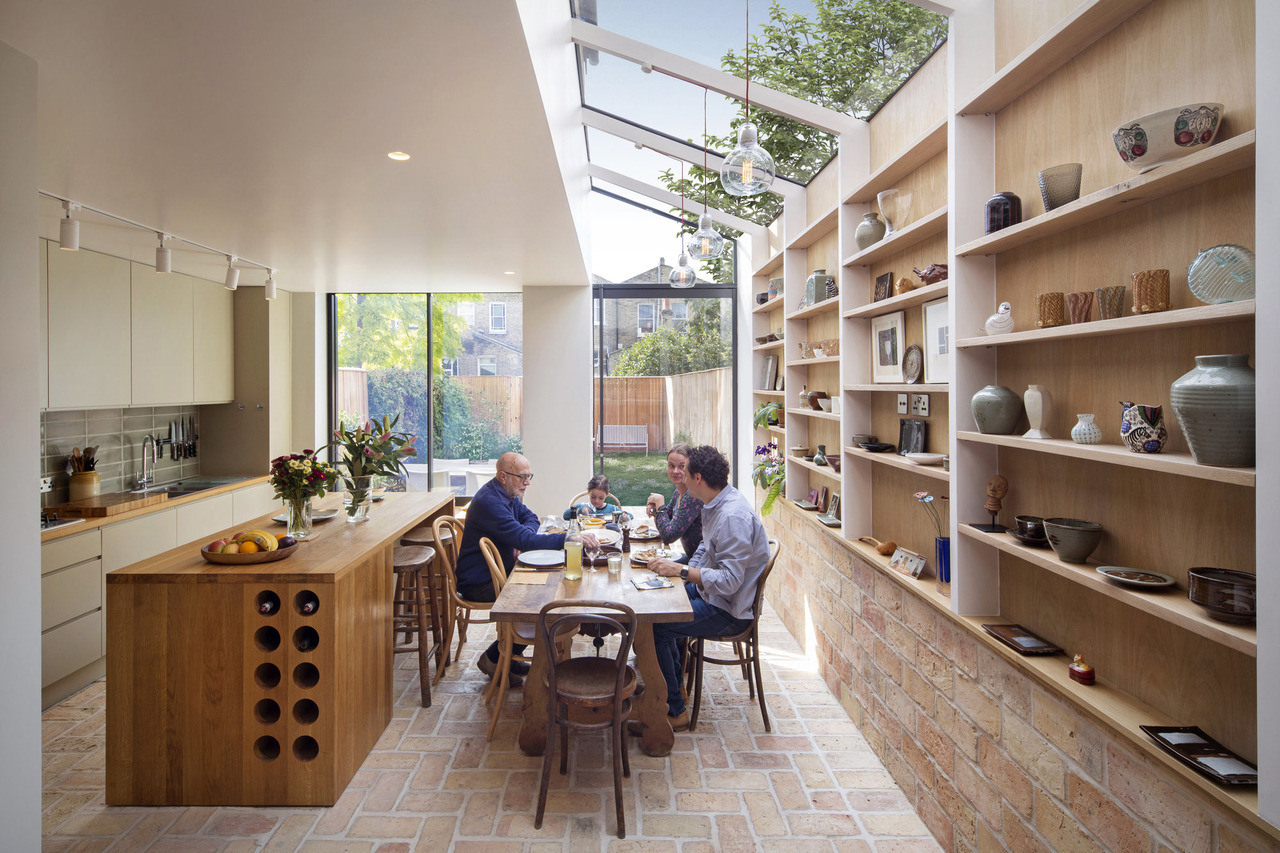 kitchen-and-dining-area-under-a-skylight-opening