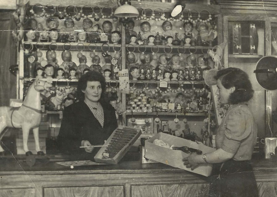 Toy shop in Kursk, Russia (1950s)
You can see many separate doll heads, they were for DIY dolls (you made the body yourself).