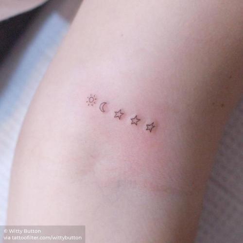 Tiny moon and star tattoo located on the wrist