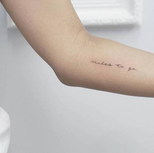 By JK Kim, done in Queens. http://ttoo.co/p/34537 small;jkkim;line art;languages;tiny;ifttt;little;miles to go;english;lettering;inner forearm;quotes;english tattoo quotes;fine line