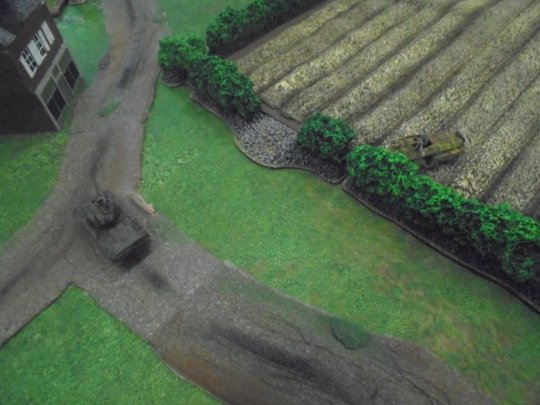 6 SdKfz233 hides from Sherman