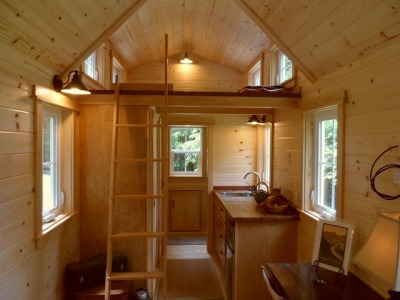 darlingamericancurl:<br /><br />For those in the Pacific North West, this is for you.  The Oregon Cottage Company has designed a jewel.  This 8’ 6” x 20’ is in my top 5 of the tiny house design.  This home has a full size bathtub, a closet for the washer/dryer (the only hidden washer space that I have come across), and a loft that comfortable sleeps four, or sleeps two with space for clothes storage.  This home can be built by the company for a mere $38,000 (the average home price in Oregon is $321,797) or the plans are available for free at the website.  <br />You can find out more information about the home here or you can download the basic plans here.  <br />