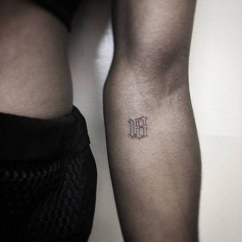 By Jin · Hoa Eternity, done in Manhattan. http://ttoo.co/p/72579 small;jin;micro;mathematical;tiny;ifttt;little;minimalist;lettering;inner forearm;on dark skin;other;illustrative;number