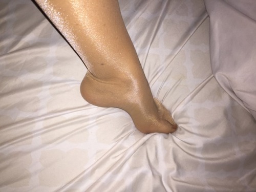 Shiny Suntan Pantyhose Couple