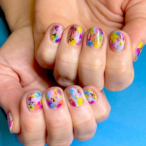 Rainbow color splash! And we couldn’t finish this mani without a...