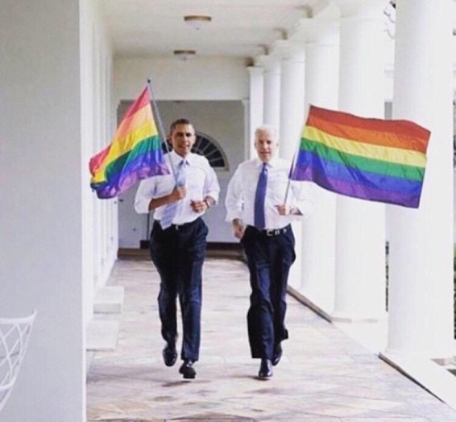 obama and biden carry gay pride flags around white house