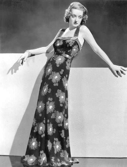 wehadfacesthen:Bette Davis wearing an Orry-Kelly gown, 1934