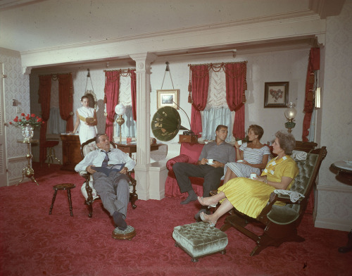 Walt and his family enjoying quiet time in the apartment they...