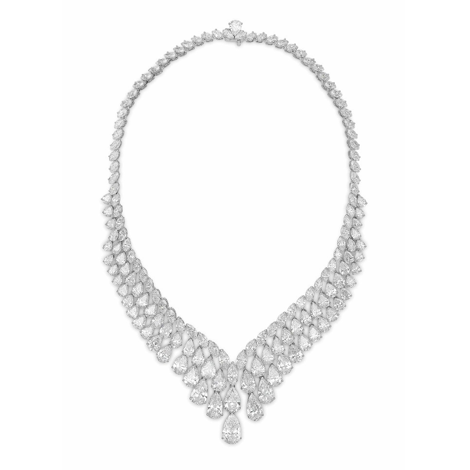 Diamonds in the Library — A DIAMOND NECKLACE: The v-shaped necklace...