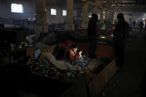 yahoonewsphotos:Trapped in Serbia, migrants shelter in a...