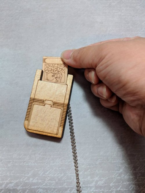 retrogamingblog:Wood Gameboy Necklace made by AdorbsRini